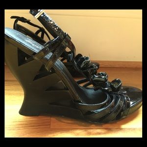 Donald J. Pliner black patent floral wedges.